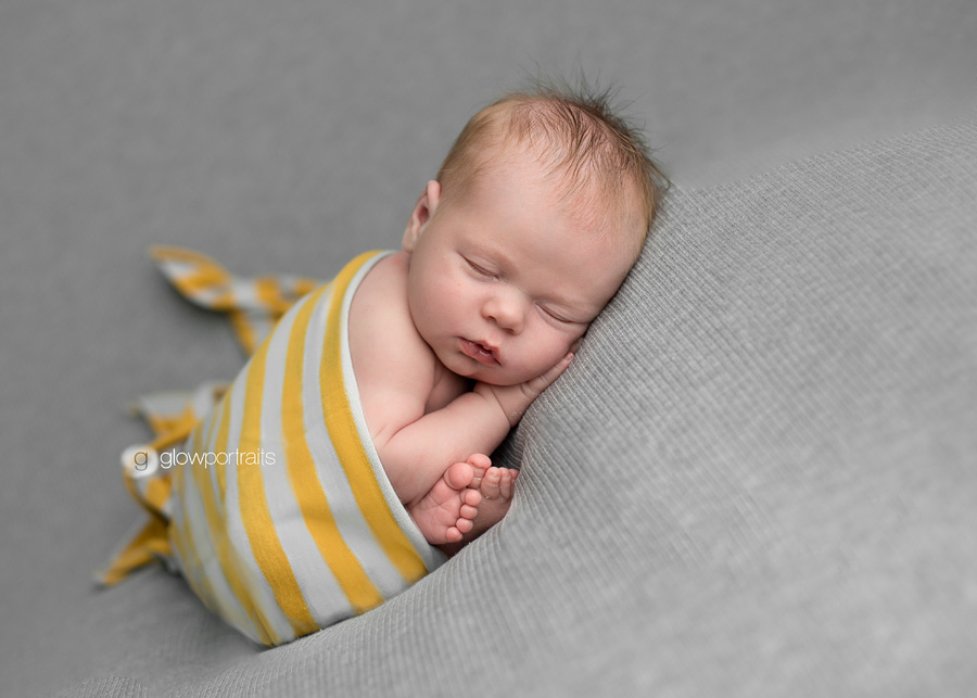 newborn taco beanbag pose with wrap