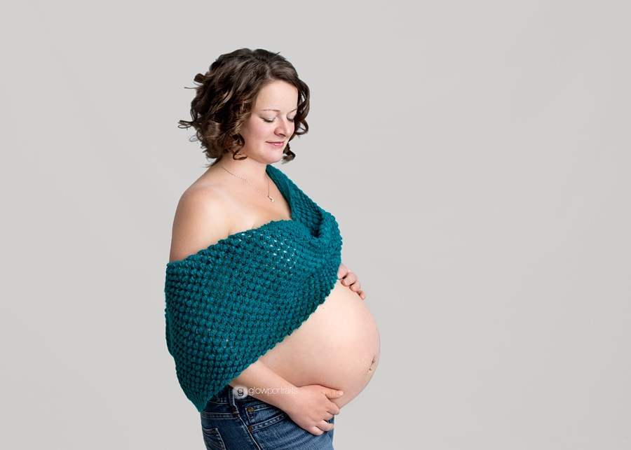 expecting mom wearing teal scarf